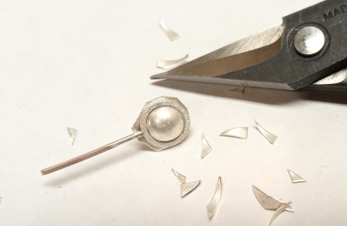 Judy Larson's Domed Stud with Drop Loop - , Metalwork, Cutting, Cutting Tool, Cutters, How To Punch Holes, Hole Punching, Punch A Hole, Stamping, Stamps, Butane Torch, Soldering, Solder,  Push the flush cut end of the square wire into the solder